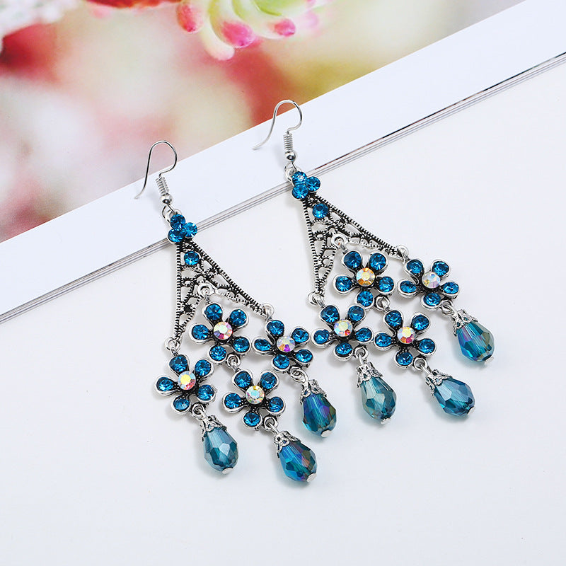 Wholesale Bohemian Retro Tassel Exaggerated Hollow Long Floral Crystal Earrings